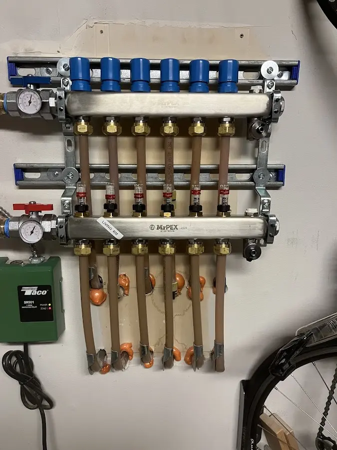 Plumber performing Gas Line Installation at a residential property in Cutler